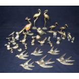 A collection of small brass birds. Largest 18cm. (Qty).