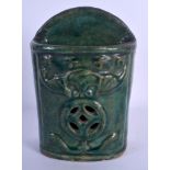 A 19TH CENTURY CHINESE GREEN GLAZED POTTERY WALL POCKET. 19 cm x 11 cm.