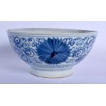 AN 18TH/19TH CENTURY CHINESE BLUE AND WHITE PORCELAIN BOWL possibly Korean, painted with floral scro