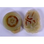 TWO EARLY 20TH CENTURY CHINESE CARVED JADE PLAQUES Late Qing. 5 cm diameter. (2)