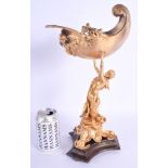 A CONTEMPORARY GILT BRONZE FEMALE CENTREPIECE modelled holding aloft a cornucopia. 39 cm high.