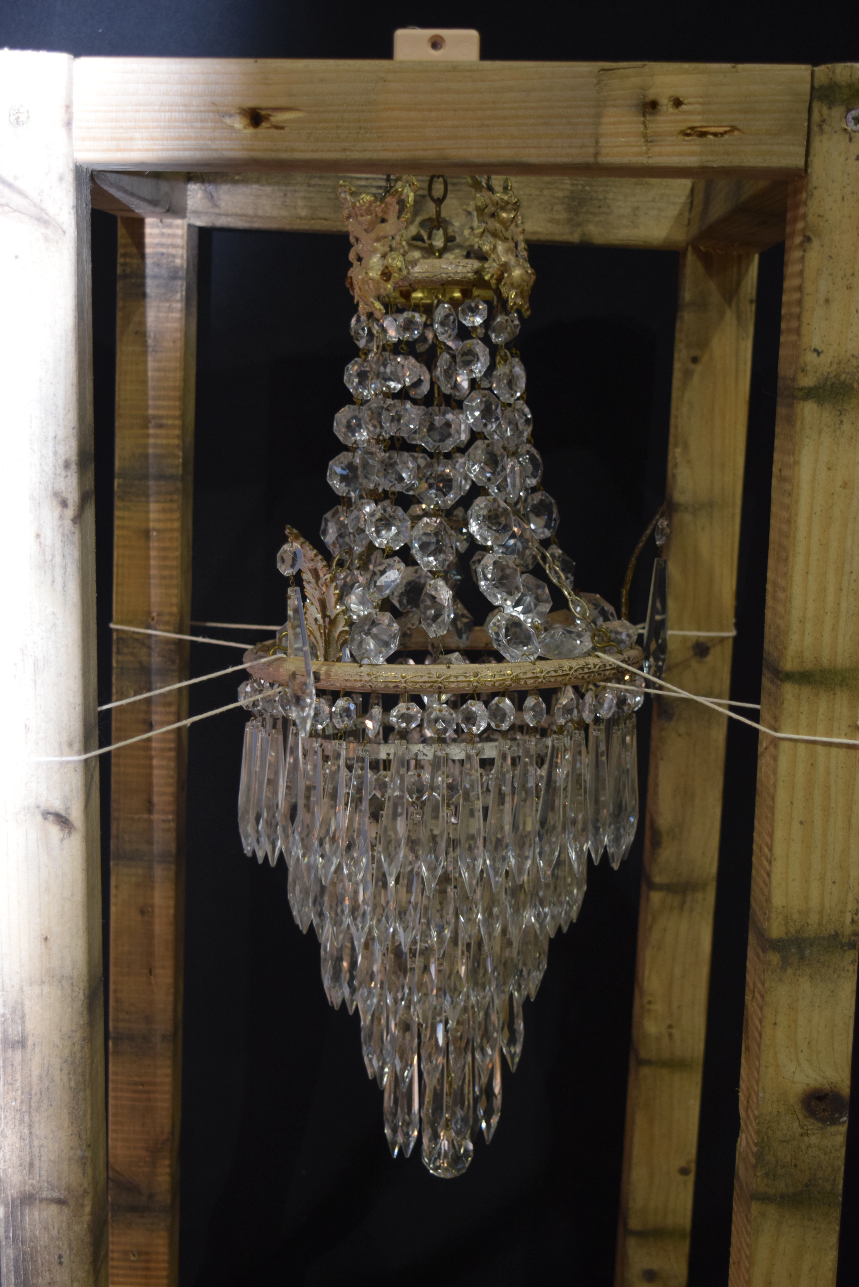 A 5 tier crystal glass chandelier with a cage of crystal and Cherubs 56 x 21cm - Image 5 of 5
