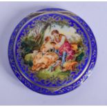 AN ANTIQUE SILVER AND ENAMEL COMPACT. 66 grams. 6 cm diameter.