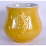 A 19TH CENTURY CHINESE MONOCHROME YELLOW GLAZED CENSER bearing Kangxi marks to base. 9.5 cm wide.