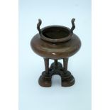 A Chinese Bronze censer on a stand 12.5 x 17cm.