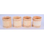 FOUR CONTINENTAL CARVED BONE NAPKIN RINGS. 4 cm x 3 cm. (4)