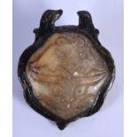 AN EARLY CHINESE MING DYNASTY BRONZE AND JADE BUCKLE with unusual lacquered surround and carved cent