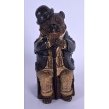 AN ANTIQUE AUSTRIAN TOBACCO JAR AND COVER in the form of a pug dog. 19 cm high.