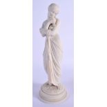 A LATE 19TH CENTURY PARIAN WARE FIGURE OF A FEMALE modelled holding a bird. 27 cm high.