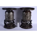 A LARGE PAIR OF 19TH CENTURY JAPANESE MEIJI PERIOD SILVER INLAID VASES ON STANDS decorated with hawk