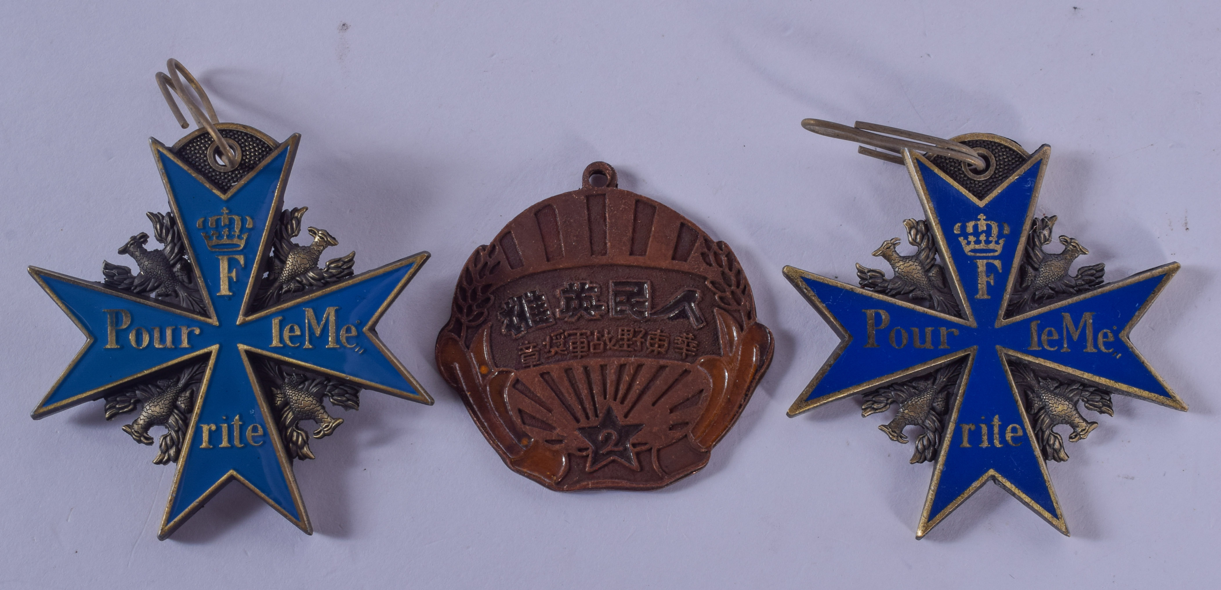 THREE CONTINENTAL MEDALLIONS. Largest 5.5 cm wide. (3)
