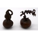 A Japanese small bronze Bonsai tree and a fruiting pod 6cm (2).