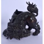 AN 18TH CENTURY JAPANESE EDO PERIOD BRONZE BUDDHISTIC LION modelled scowling. 14 cm x 12 cm.