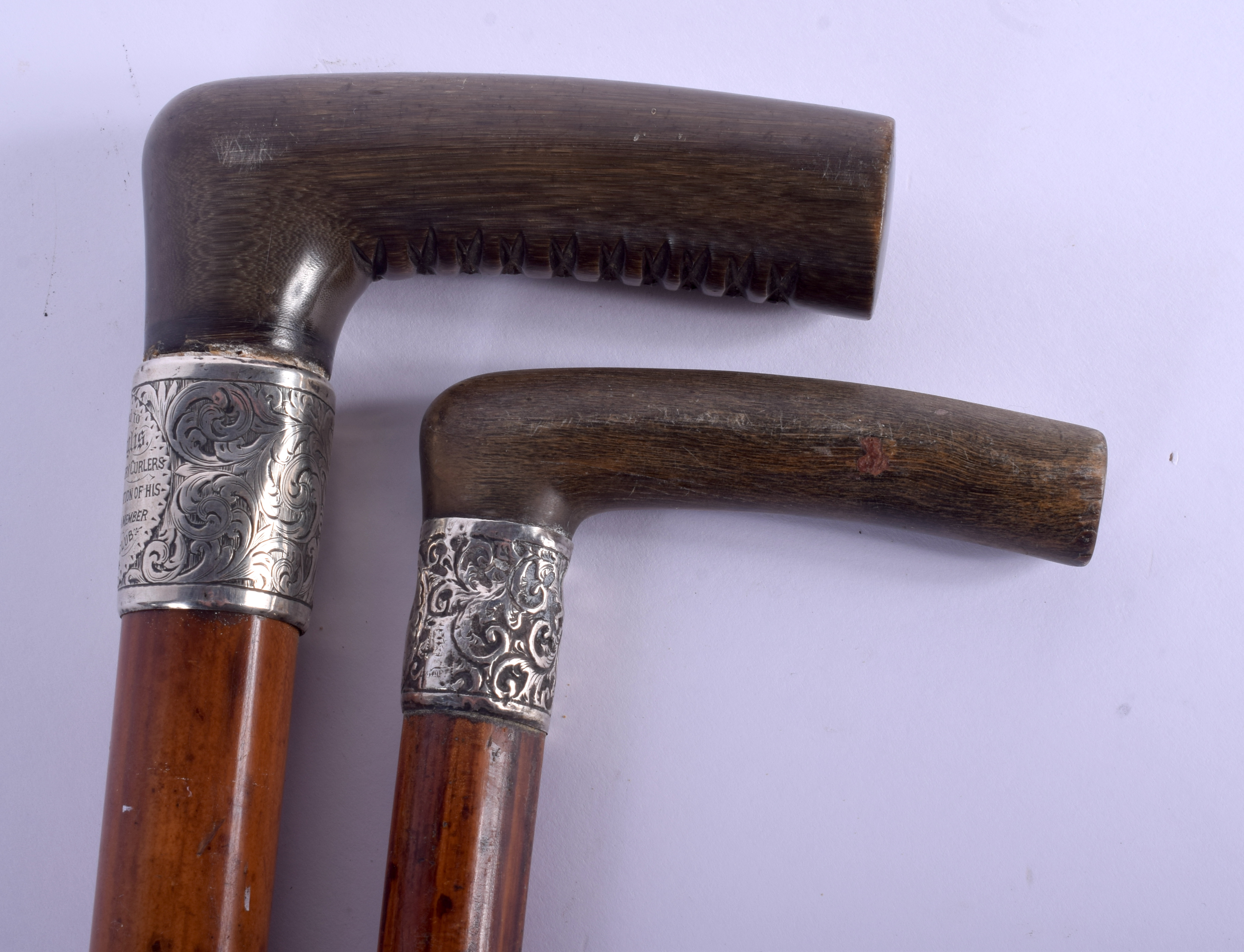 TWO 19TH CENTURY CONTINENTAL CARVED RHINOCEROS HORN HANDLED WALKING CANES. 88 cm long. (2) - Image 2 of 3