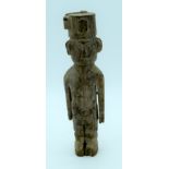 A Colonial wooden African figure of a male 24 cm.