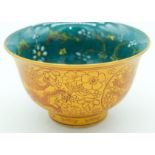 A small Chinese bowl decorated with Dragons 7.5 x 12.5cm.