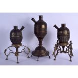 A LARGE 19TH CENTURY MIDDLE EASTERN INDIAN BRONZE HOOKAH PIPE together with two others. Largest 44 c