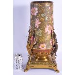 A LARGE 19TH CENTURY ENAMELLED POTTERY CONICAL FORM VASE painted with flowers, upon a bronze base. 5