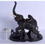 A LARGE 19TH CENTURY JAPANESE MEIJI PERIOD OKIMONO modelled as an elephant, upon a stand. 30 cm x 38