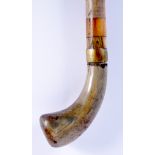 A 19TH CENTURY CONTINENTAL FULL LENGTH RHINOCEROS AND BUFFALO HORN WALKING CANE. 88 cm long.