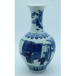 A Chinese blue and white vase decorated with figures 40cm.