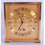 A VINTAGE IMEXAL BRASS MOON PHASE MANTEL CLOCK. 18 cm x 15 cm.