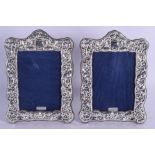 A PAIR OF SILVER PHOTOGRAPH FRAMES. 20 cm x 17 cm.