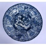 A 19TH CENTURY CHINESE BLUE AND WHITE KRAAK DISH painted with ducks in a landscape. 38 cm diameter.