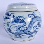 AN EARLY 20TH CENTURY CHINESE BLUE AND WHITE PORCELAIN JAR AND COVER painted with dragons. 12 cm x 1