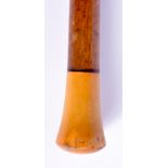 A 19TH CENTURY CARVED RHINOCEROS HORN HANDLED WALKING CANE. 88 cm long.