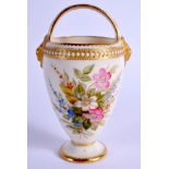 Royal Worcester over handled vase painted with heather by impress mark. 12.5cm high.