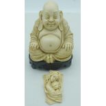 A Faux Buddha and a small European plaque Largest 20cm (2).