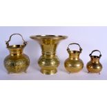 FOUR MIDDLE EASTERN BRASS VASES. Largest 21 cm high. (4)