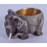 A CONTINENTAL SILVER AND RUBY ELEPHANT SALT. 156 grams. 5 cm x 3 cm.