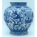 A Chinese blue and white jar decorated with phoenix and dragons 18cm.