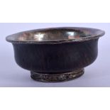 A 19TH CENTURY CHINESE TIBETAN SILVER WOODEN BOWL. 10 cm diameter.