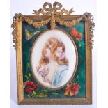 A 19TH CENTURY FRENCH ART NOUVEAU ENAMELLED PORTRAIT MINIATURE FRAME. 24 cm x 16 cm.