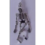 A SILVER SKELETON PENDANT. 21 grams. 8 cm x 2.5 cm.