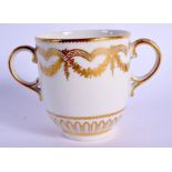 18th c. Derby finely gilt chocolate cup and saucer gilded in neo-classical style with ribbons and sw