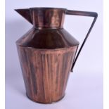 AN ARTS AND CRAFTS PERRY & CO COPPER JUG in the manner of Dr Christopher Dresser. 25 cm high.