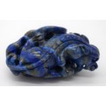 A carved Lapis Lazuli bolder in the form of a dragon 6cm.