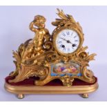 A 19TH CENTURY FRENCH GILT BRONZE AND SEVRES PORCELAIN MANTEL CLOCK painted with figures. 29 cm x 22