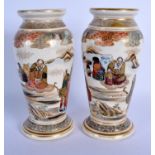 A PAIR OF LATE 19TH CENTURY JAPANESE MEIJI PERIOD SATSUMA VASES painted with immortals within landsc