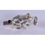A SILVER FROG WHISTLE. 16 grams. 4.5 cm wide.