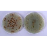 TWO EARLY 20TH CENTURY CHINESE CARVED JADE PLAQUES Late Qing. 5 cm diameter. (2)