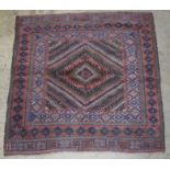 A small Afghan rug 126 x 125cm.