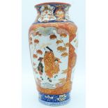 A large Japanese Kutani vase decorated with figures and foliage 37cm.