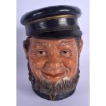 AN ANTIQUE AUSTRIAN TOBACCO JAR AND COVER in the form of a bearded male. 21 cm high.
