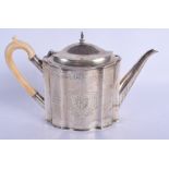 AN ANTIQUE IVORY HANDLED SILVER TEAPOT AND COVER. 864 grams. 28 cm x 17 cm.