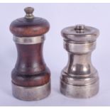 TWO SILVER MOUNTED PEPPER MILLS. Largest 10.5 cm high. (2)